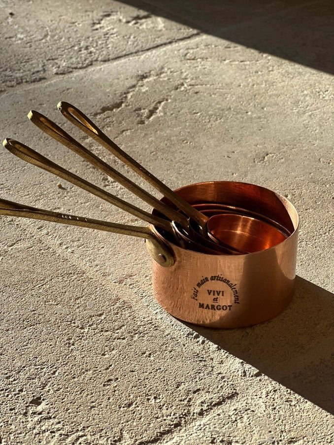 Vintage Copper Measuring Cups Set of 4 Brass Handles top