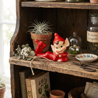 Retro Laying Down Elf Figurine