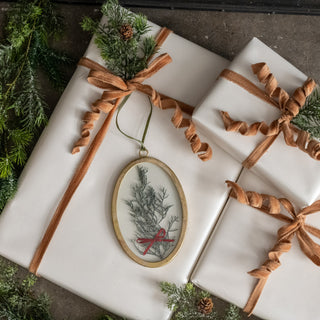 Oval Pressed Holiday Floral Ornament
