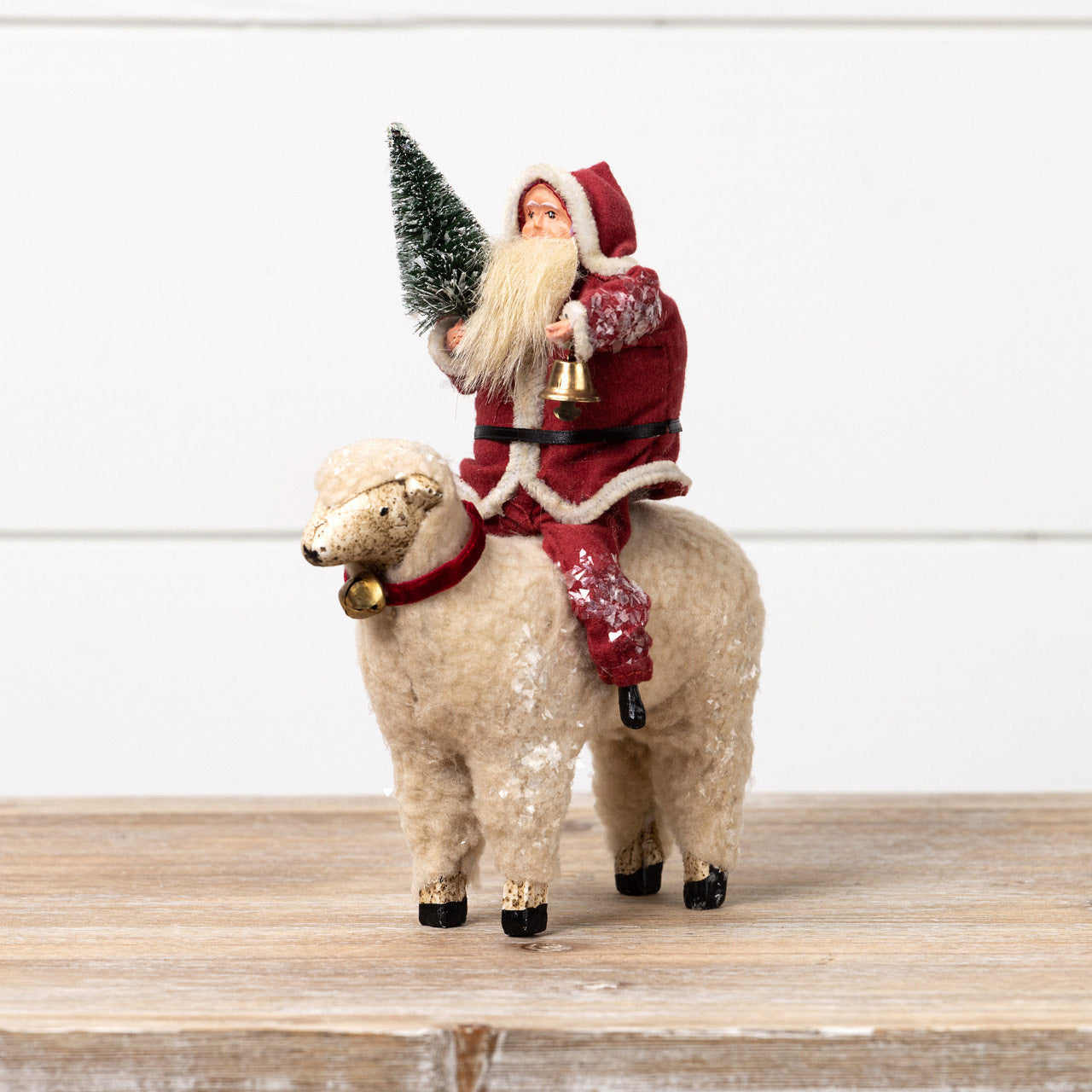 Vintage Style Paper Mache Santa on Sheep